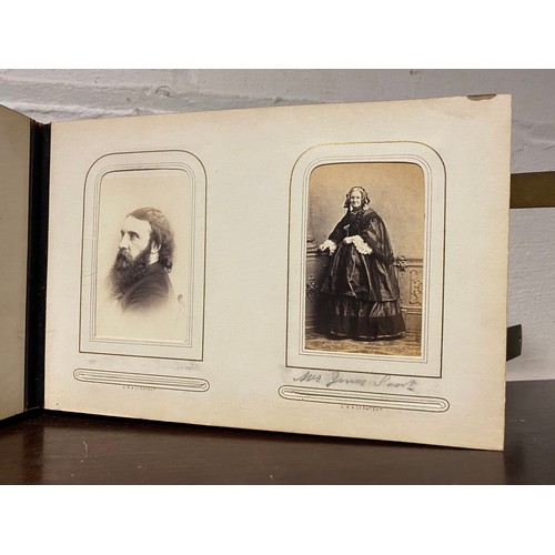 300 - A Victorian carte-de-visite album and contents, to include Charles Dickens, Baring family, Charles N... 