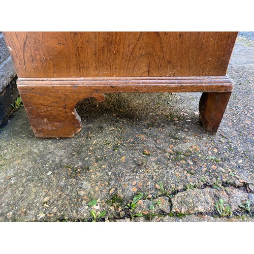 417 - A 19th century chest, fitted with two short and three long drawers and bracket feet -