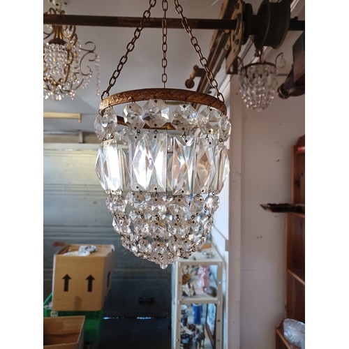 421 - A bag chandelier, hung with glass drops, and two other chandeliers -