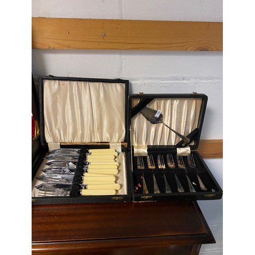 95 - A silver plated canteen of cutlery, cased fish eaters and a cased fruit set -