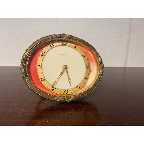 444 - An early 20th century gilt bronze 8-day strut clock, by Tiffany & Co (a/f) -