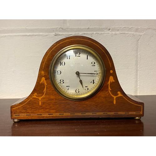 445 - An Edwardian mahogany and inlaid 8 day mantel clock -