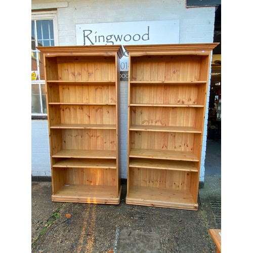 451 - A pair of pine floor standing bookcases -