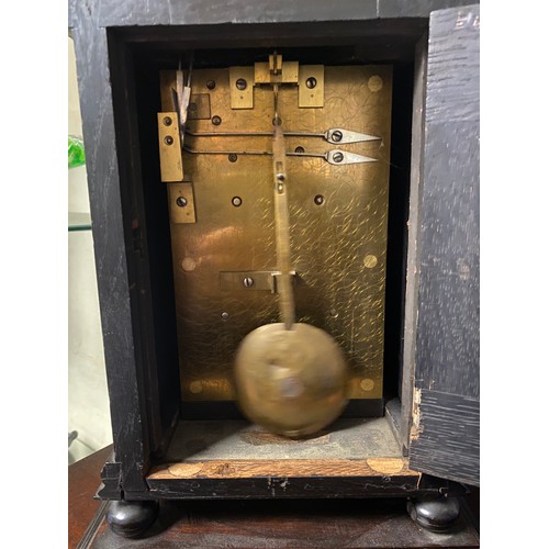 406 - A 19th century bracket clock, with steel chapter ring and subsidiary dial on velvet back, all in ebo... 