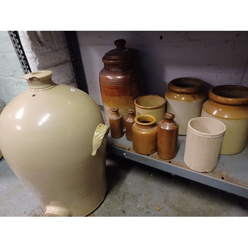 471 - A group of stoneware jars and bottles -