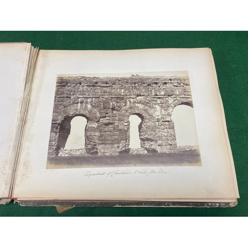 223 - A Grand Tour album of Italian photographs in 'Roma' album and a quantity of vintage books -