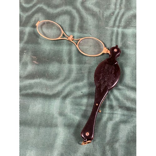 237 - A pair of antique tortoiseshell folding spectacles -