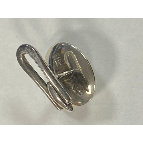 23 - A pair of Georg Jensen silver cufflinks, each oval with inset stone, signed -