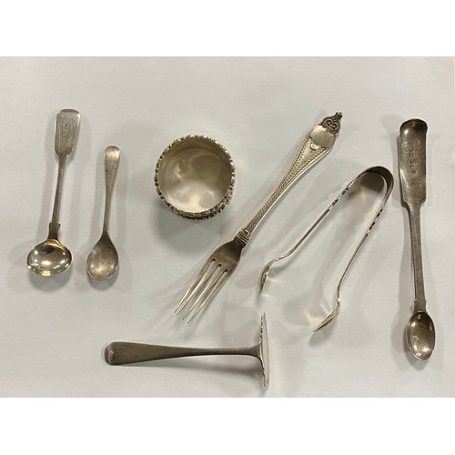 29 - A mixed lot of silver, including a pair of filled candlesticks, napkin ring, tongs etc -