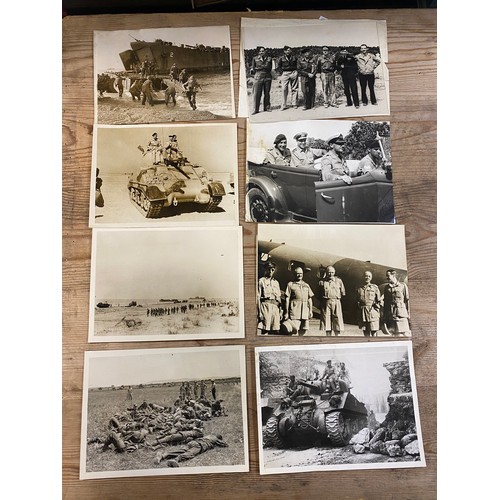 318 - An interesting collection of WW2 press photographs, including General Montgomery and Allied Chiefs i... 