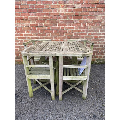 468 - A reclaimed teak garden set, constructed from timbers from SS Begum -