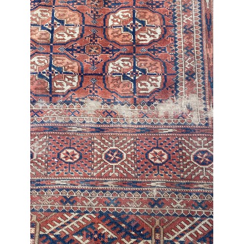 392 - An Eastern rug, approximately 191cm x 112cm -