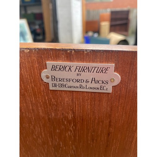 405 - A vintage Berick Furniture sideboard, by Beresford and Hicks, with glazed top on a base fitted with ... 