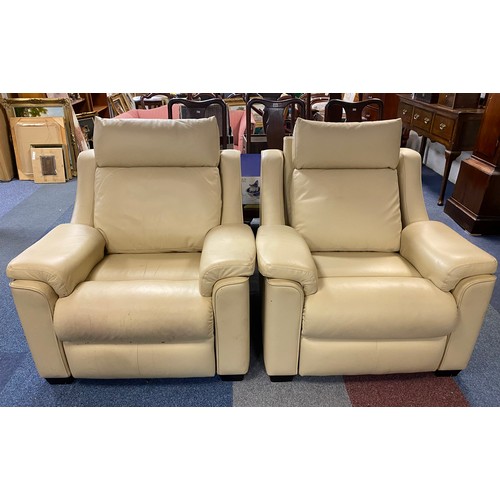 419 - A Parker Knoll leather suite, comprising a sofa and two reclining armchairs -