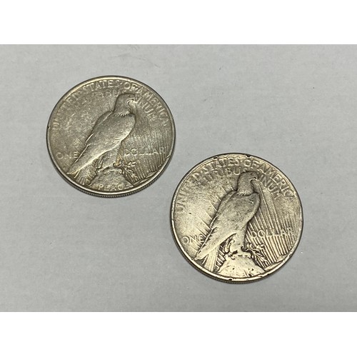 363 - Coins: two American silver dollars, 1923 and 1934 -