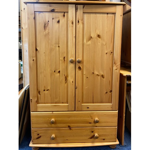 451 - A pine dressing table/desk, together with a pine bedside chest, pine linen box and a small wardrobe ... 