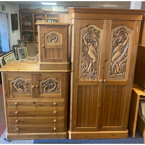 382 - A pine part bedroom suite, each piece with carved female nudes, comprising wardrobe, chest and bedsi... 