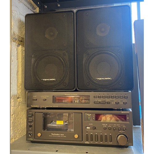 263 - A Technics stereo with two pairs of speakers -