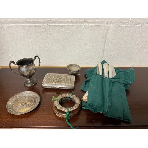 11 - A small group of silver and white metal items, including silver trophy cup, white metal cigarette ca... 