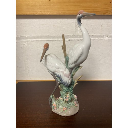 138 - A Lladro model of two heron -