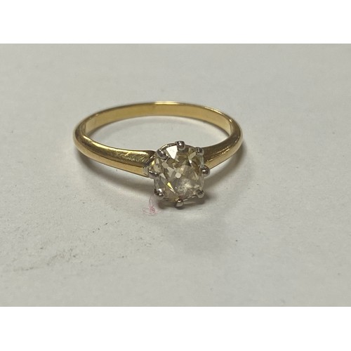 51 - A diamond single stone ring, set with an old oval cut diamond, in gold mount -