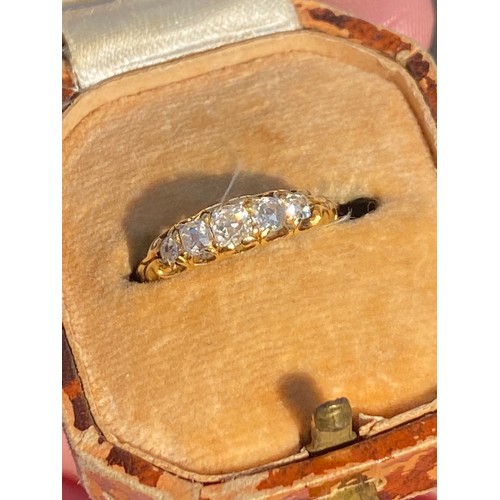 52 - An antique five stone diamond ring, set with graduated diamonds in yellow gold mount -