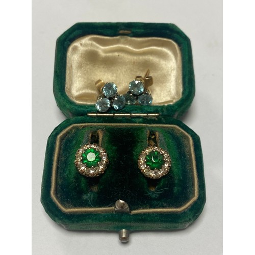 55 - A pair of zircon set earrings and a pair of paste cluster earrings -