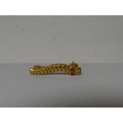 58 - A WW2 'Caterpillar Club' brooch, designed as a caterpillar with ruby eyes, named to the reverse for ... 