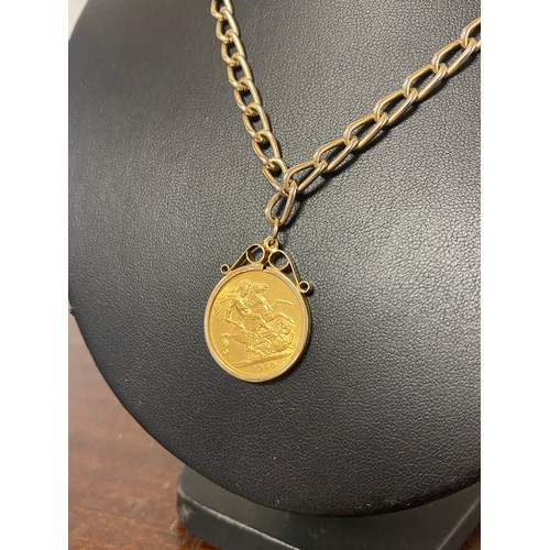 59 - A 1958 Sovereign, in 9ct gold pendant mount, to plated chain -