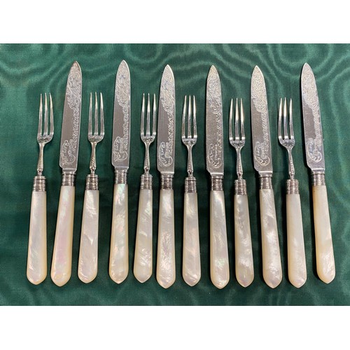 76 - A set of six Edwardian silver and mother-of-pearl handled fruit knives and forks, silver blades hall... 