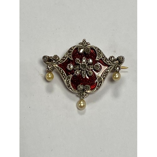 85 - An antique diamond and enamel set brooch, with shaped enamel panel set with rose cut diamond highlig... 