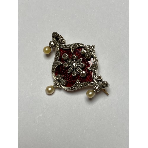 85 - An antique diamond and enamel set brooch, with shaped enamel panel set with rose cut diamond highlig... 