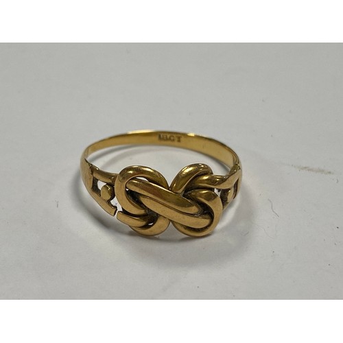 92 - An 18ct gold ring, of knot design (split) -