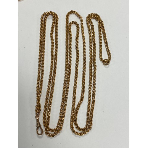 96 - A 19th century muff/long chain, stamped 9ct, to dog clip -