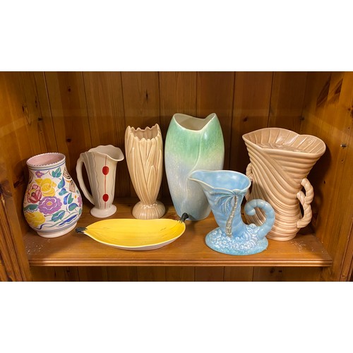 59 - A mixed lot of pottery, including Poole, Sylvac and Beswick -