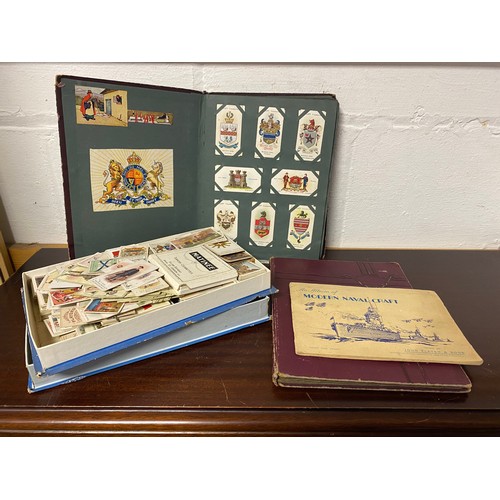 180 - Cigarette cards: assorted cigarette cards in albums and loose -