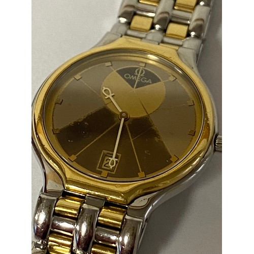 25 - Omega: a Pyramid Symbol wristwatch, the signed dial with date aperture, with steel bi-coloured strap... 