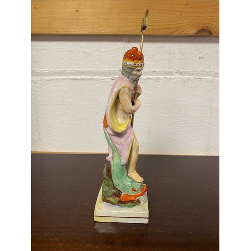 81 - A 19th century Staffordshire figure of Neptune, with trident -