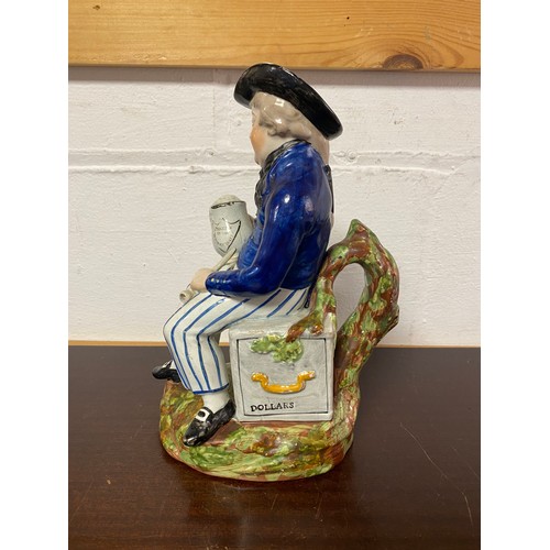 82 - A Prattware 'American Sailor' Toby jug -