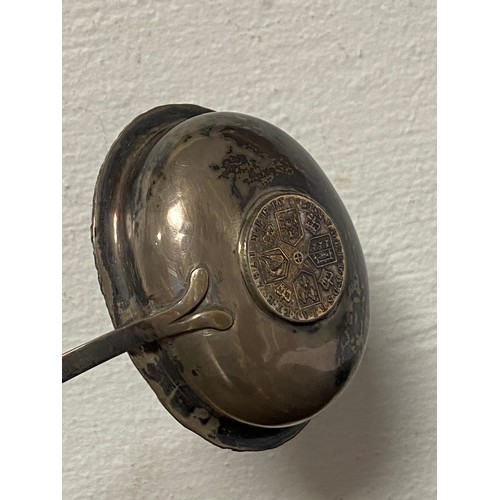 46 - A Georgian toddy ladle, the white metal bowl inset with a 1787 George III coin, to twisted baleen ha... 