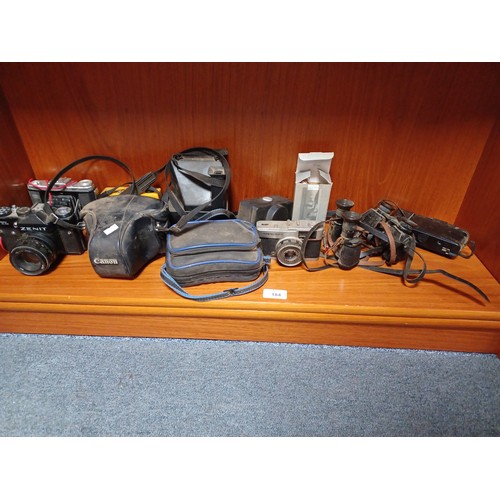 184 - A quantity of camera equipment -