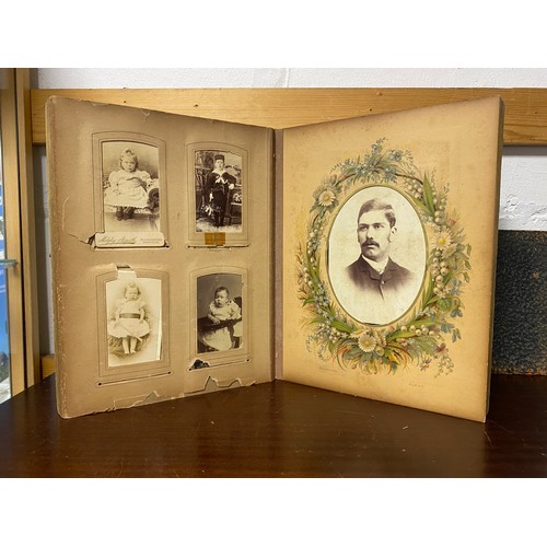 161 - A Victorian photograph album, containing a quantity of carte de visite and studio photographs, toget... 