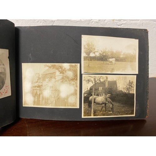 161 - A Victorian photograph album, containing a quantity of carte de visite and studio photographs, toget... 