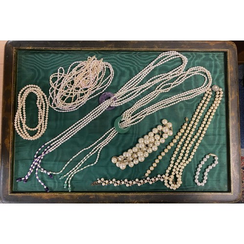 17 - A small quantity of pearl and faux pearl necklaces and bracelets, including two lariats set with sem... 