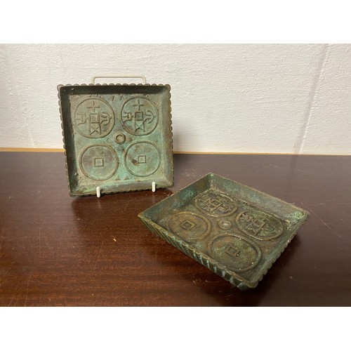 68 - A pair of Chinese bronze dishes -