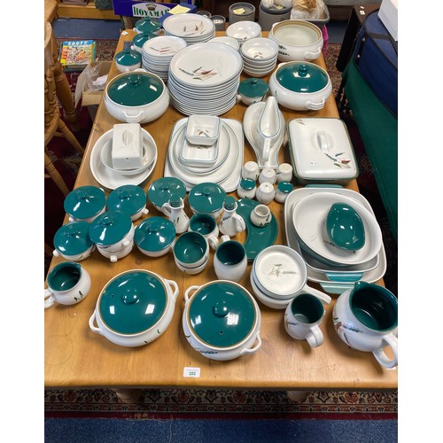 81 - An extensive Denby 'Greenwheat' dinner service -