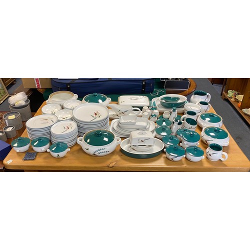 81 - An extensive Denby 'Greenwheat' dinner service -