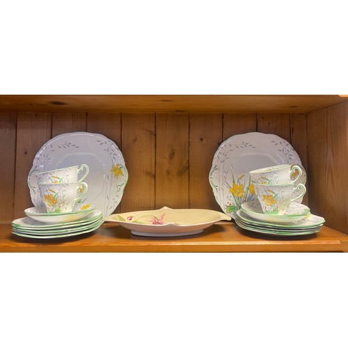 109 - An Art Deco style 'daffodils' part tea set and a Royal Winton fuchsia dish -