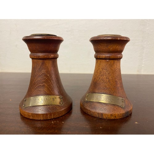 216 - A pair of reclaimed teak candlesticks, from HMS Ganges -