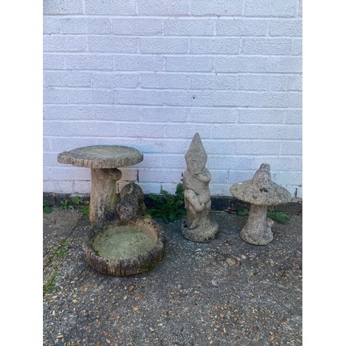 358 - A birdbath, a gnome and a small garden mushroom -